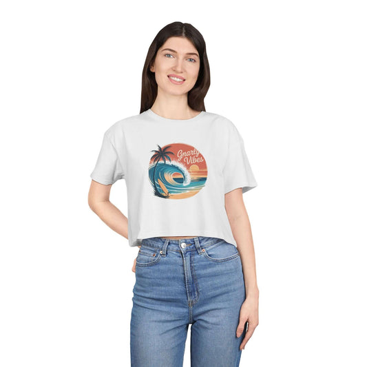 Ladies Crop Top featuring a retro big wave surf design with 'Gnarly Vibes' and a sunset beach backdrop.