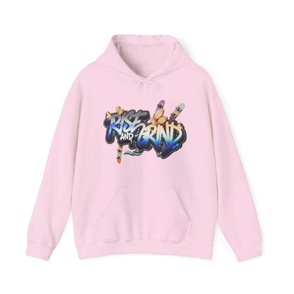 Hooded sweatshirt in pink with graffiti 'Rise and Grind' design, featuring skateboards and urban style.