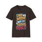 Funny typography T-shirt with quote "I may be wrong, but I really doubt it" in vibrant colors on a black background.