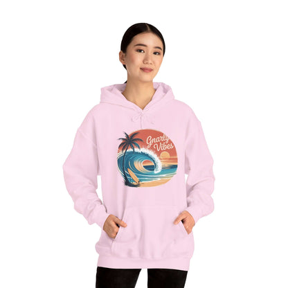 Vintage Sunset Beach Hoodie with big wave design, evoking gnarly vibes and surf culture in a cozy pink style.