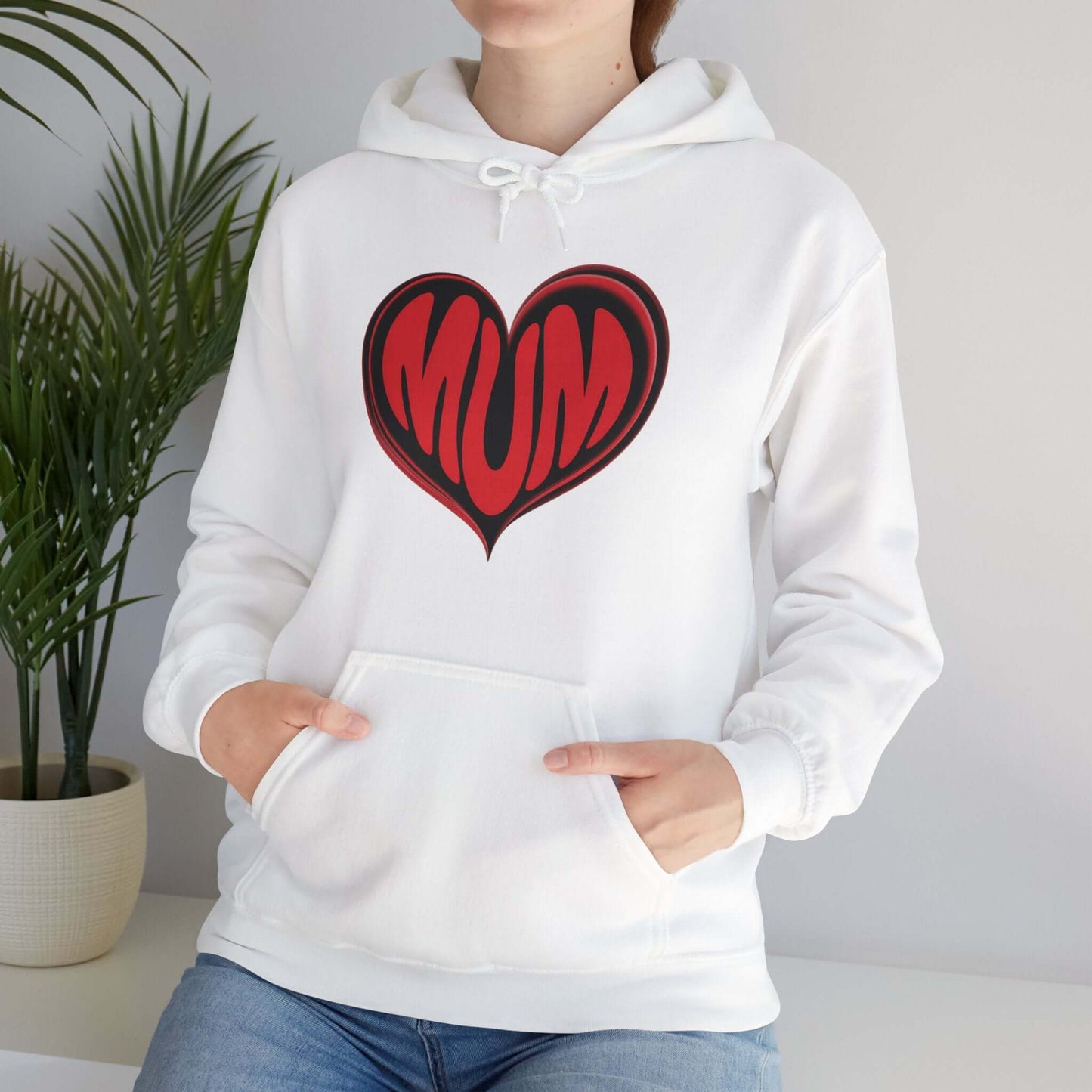 Unisex white hoodie featuring red 'MUM' heart design, perfect for Mother's Day and stylish comfort.