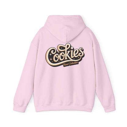 Vintage-inspired pink hoodie with hand-lettered 'Cookies Trend Collective' design in elegant script.