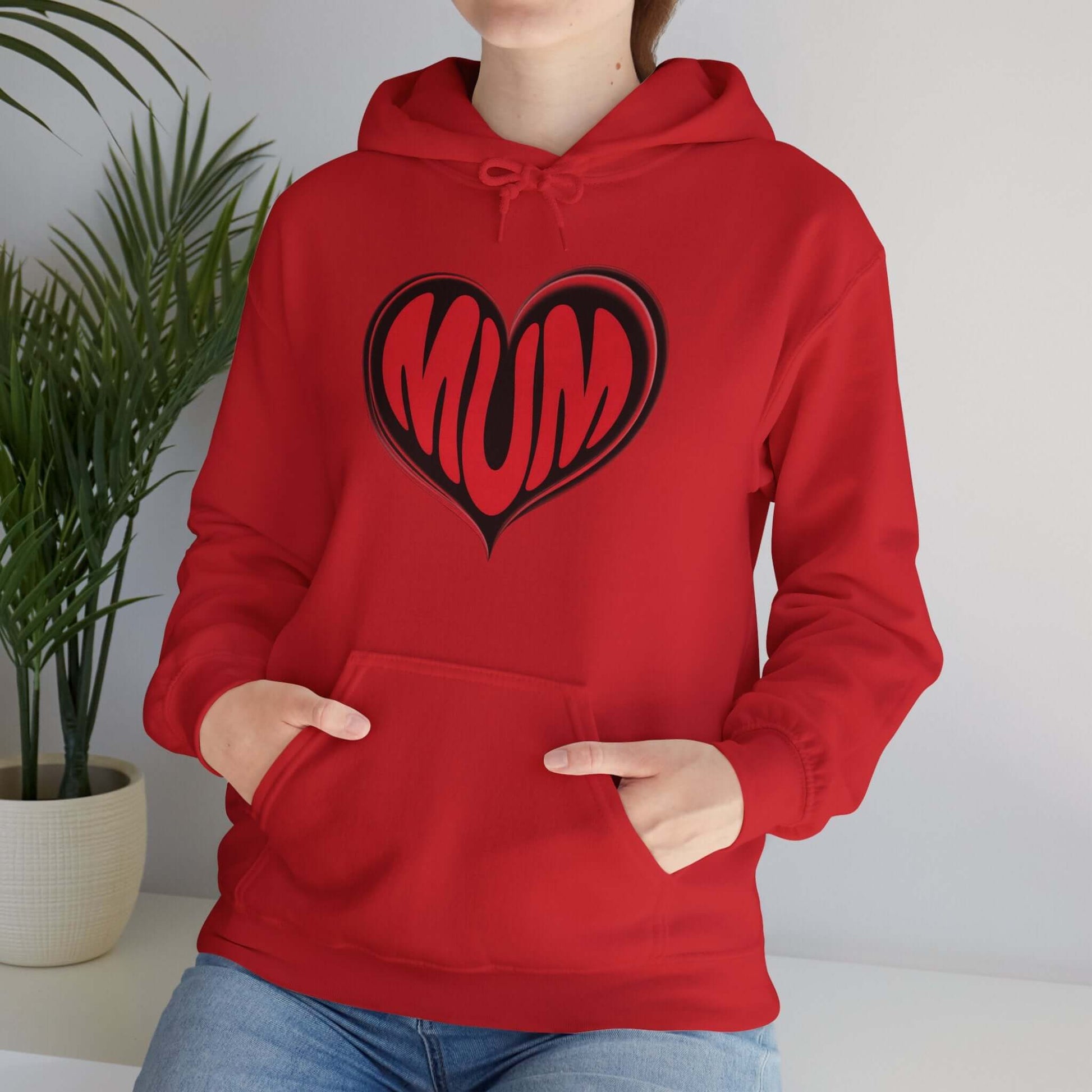Red hooded sweatshirt with 'MUM' heart design, perfect for Mother's Day and stylish casual wear.