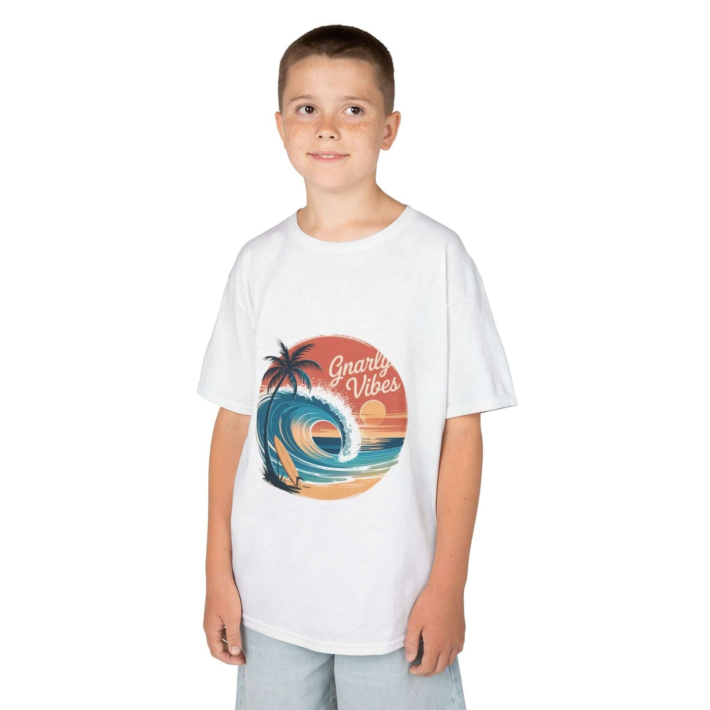 Kids tee featuring a retro big wave surf design with 'Gnarly Vibes' and a sunset beach backdrop.