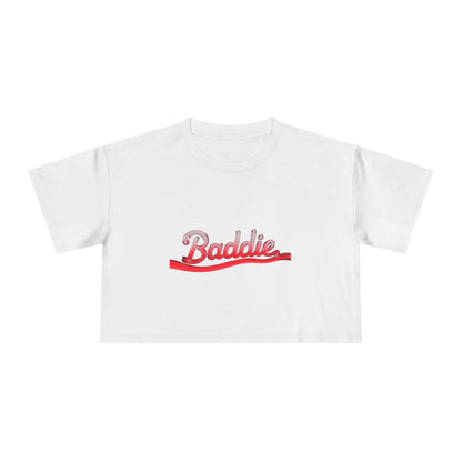 Trendy women's crop tee featuring liquid red text design 'Baddie', perfect for cool, edgy streetwear fashion.