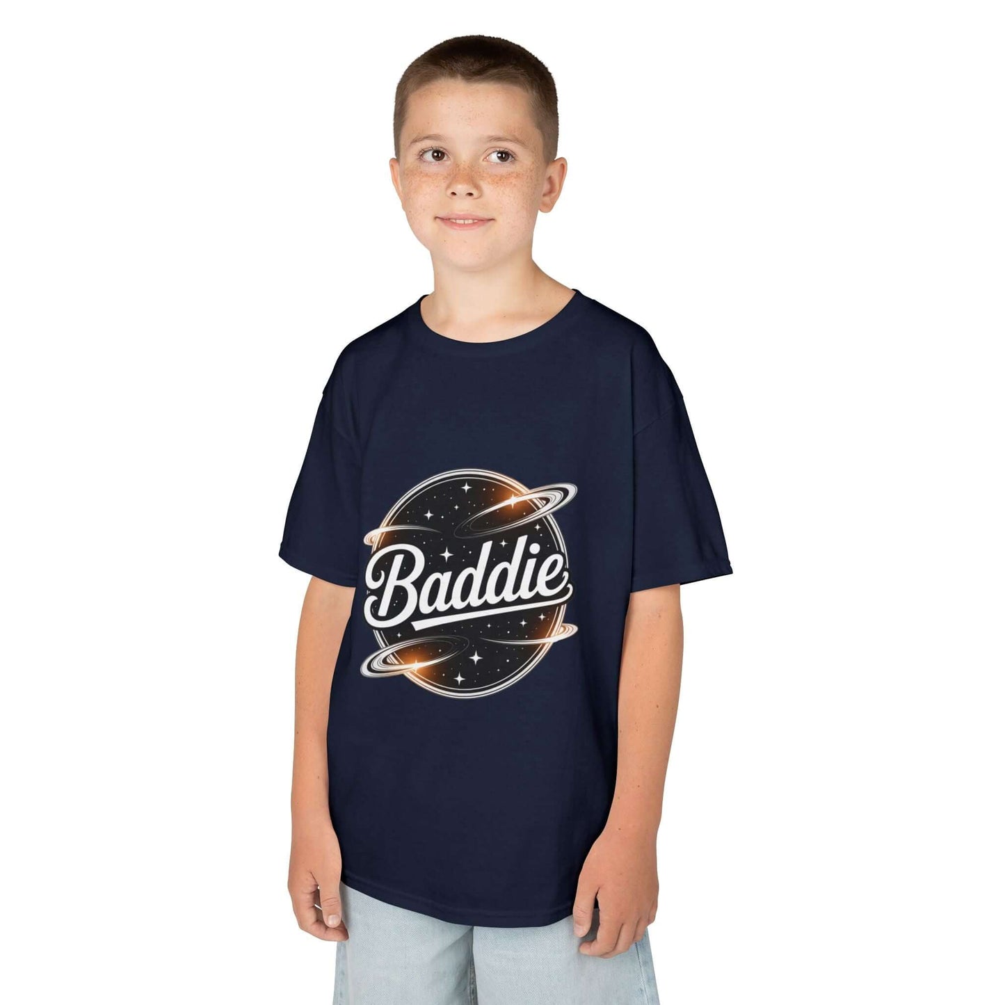 Child wearing a navy blue kids tee with retro 'Baddie' universe design, featuring planets and stylish text.