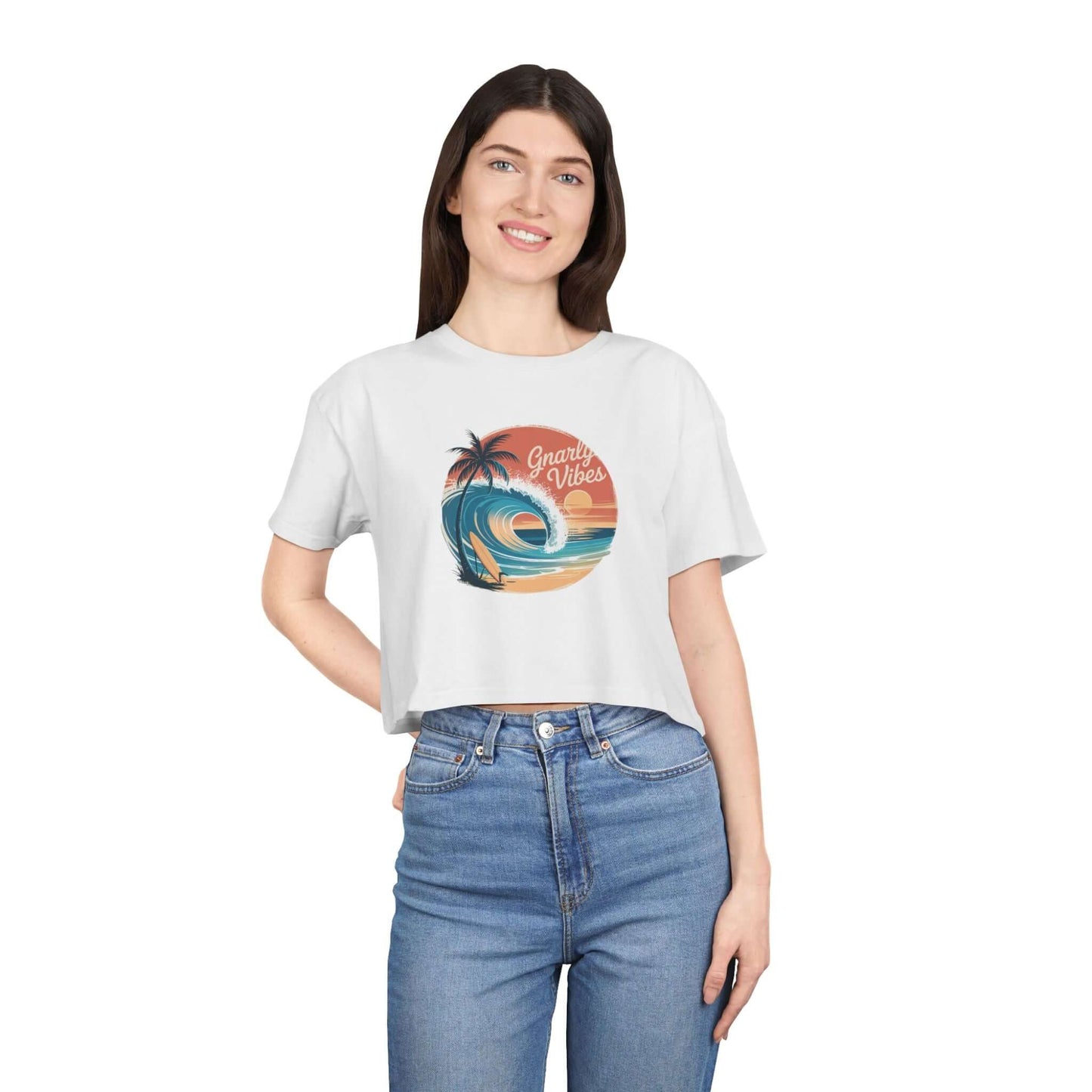 Ladies Crop Top featuring a retro big wave surf design with 'Gnarly Vibes' and a sunset beach backdrop.