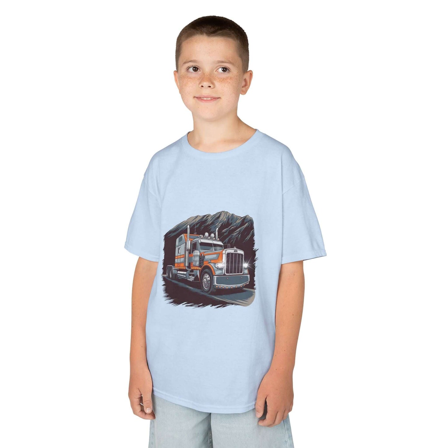 Boy wearing a light blue Kids Tee featuring a cool custom truck design, perfect for truck lovers.