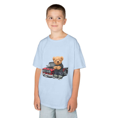 Light blue kid's t-shirt featuring a cute teddy bear with a vintage pickup truck design, perfect for car lovers.