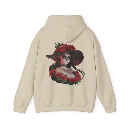 Chibi style woman with sugar skull makeup and roses on a cream hoodie, perfect for Halloween and Day of the Dead festivities.
