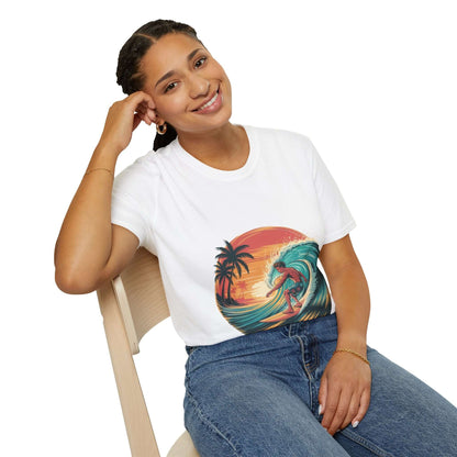 Smiling woman in a vintage surfer T-shirt featuring a surfer on a turquoise wave at sunset.
