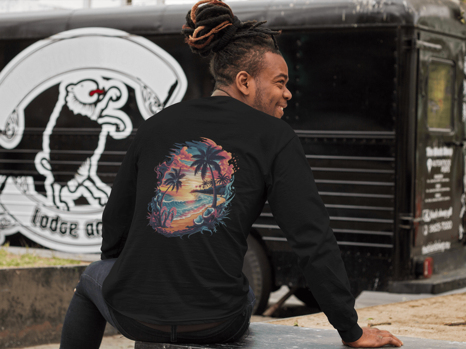 Long sleeve shirt featuring a vibrant tropical sunset beach scene with palm trees and coastal vibes.