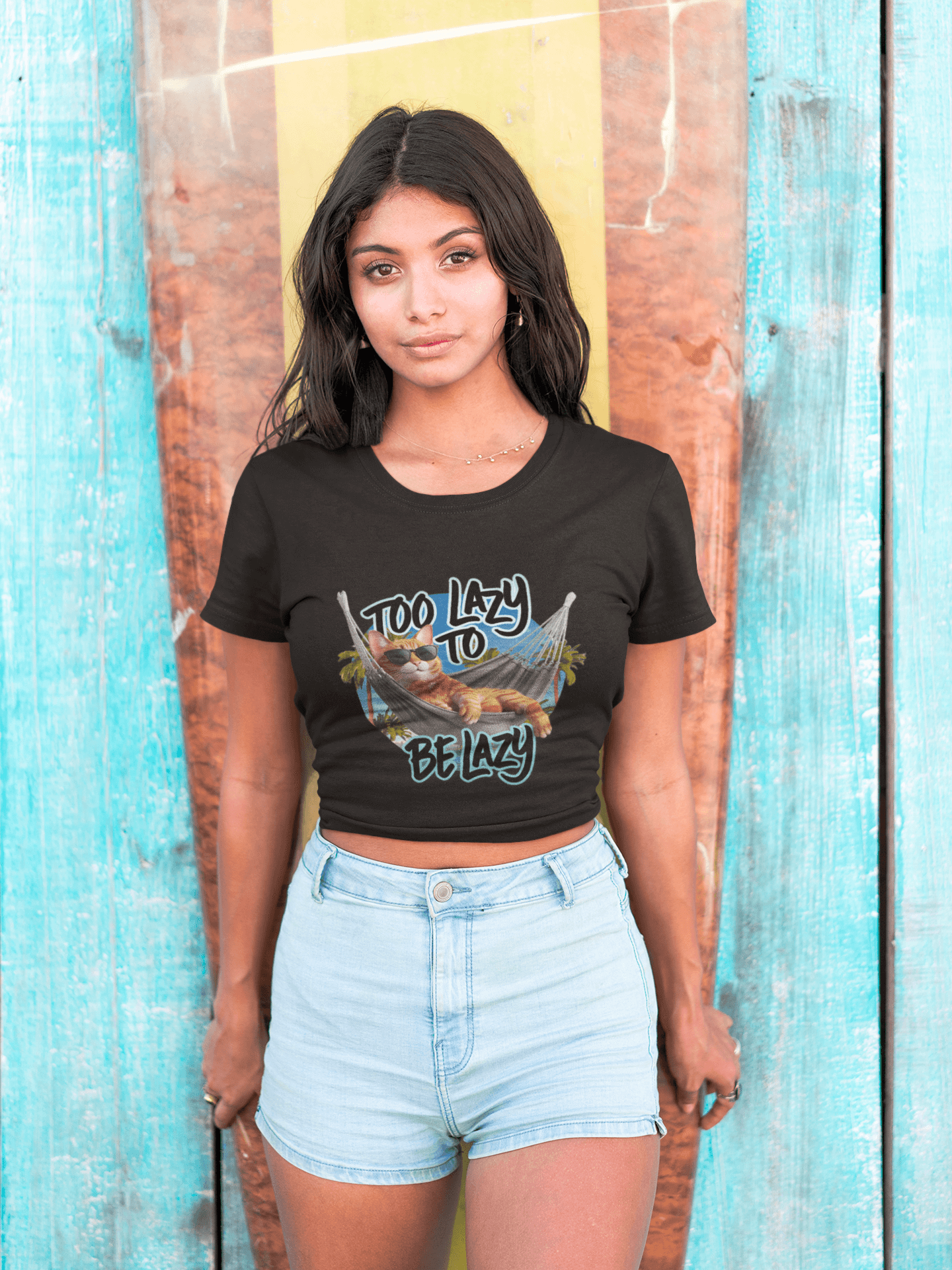 Black woman's crop top with lazy cat at beach design and 'Too Lazy to be Lazy' text, perfect for summer vibes and cat lovers.