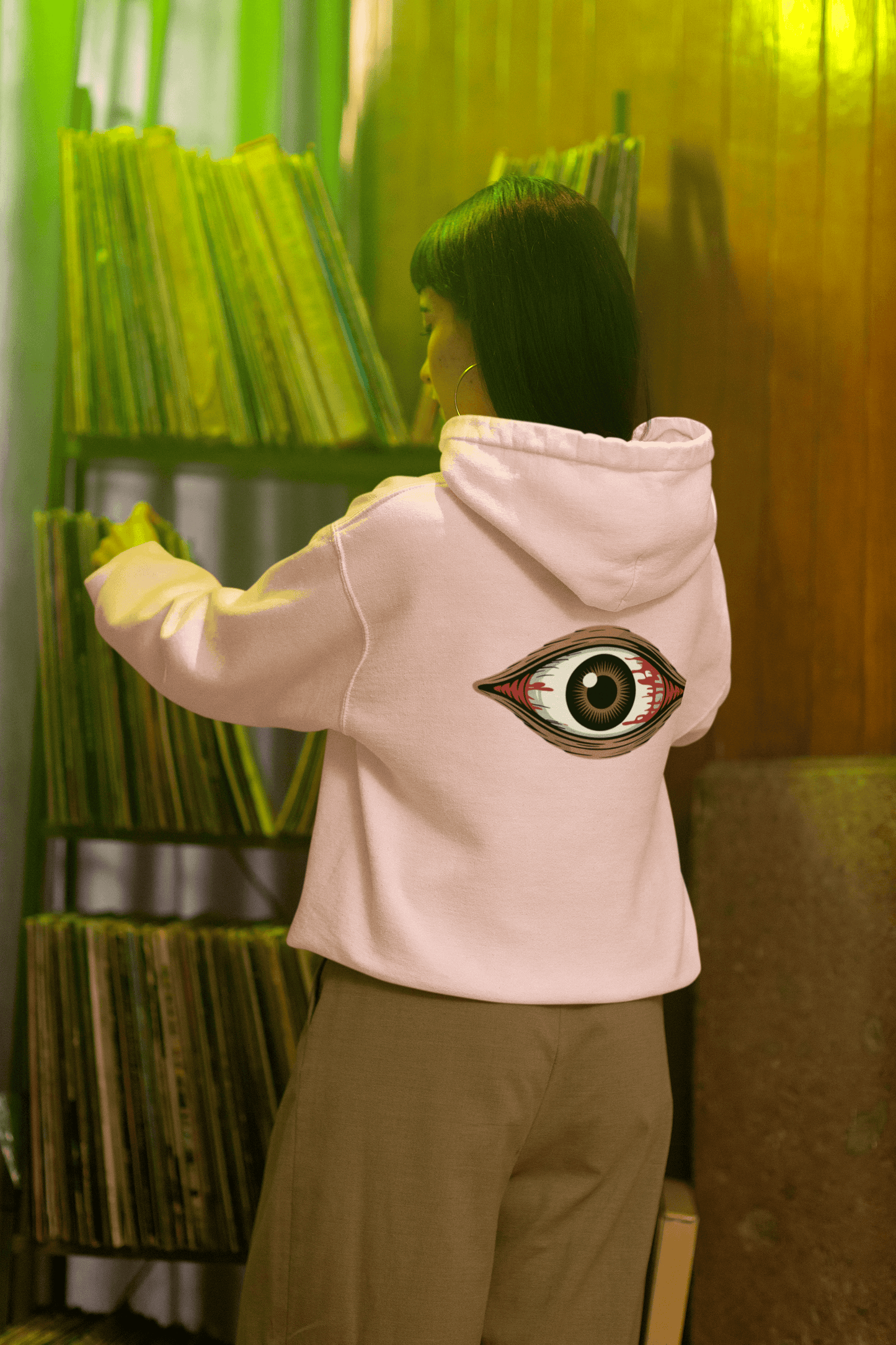 Unisex Bloody Brown Eye hoodie, perfect for music festivals and Halloween, shown with unique design and cozy fit.