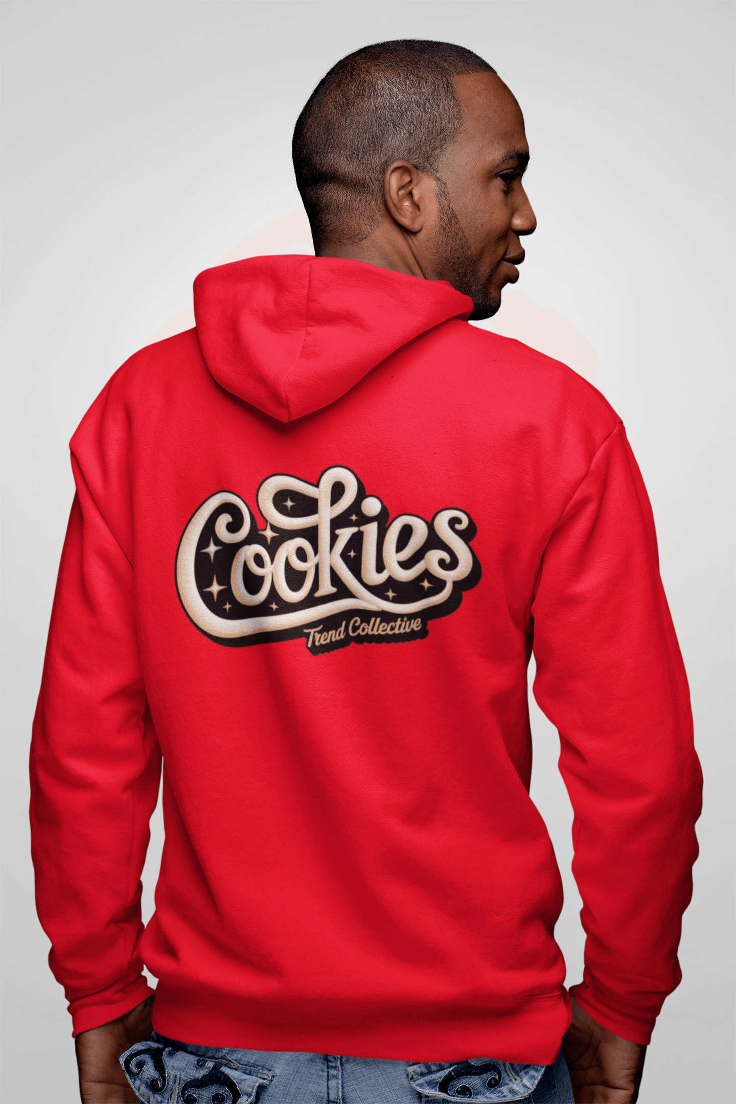 Red hoodie with vintage Cookies Trend Collective design in swirling script, perfect for cozy casual wear.
