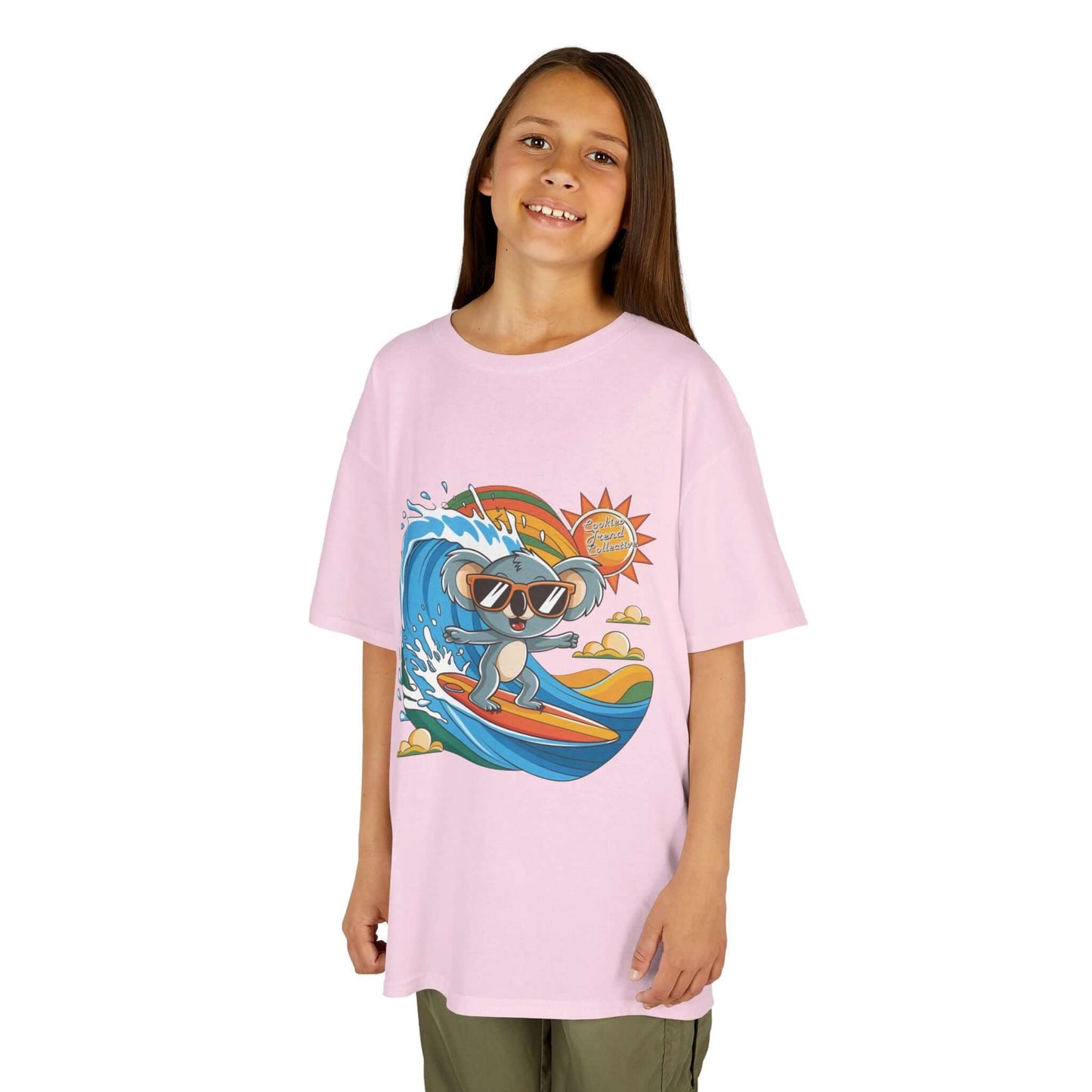 Light pink kid's tee featuring a cool surfing koala riding a wave, perfect for beach-loving toddlers and families.
