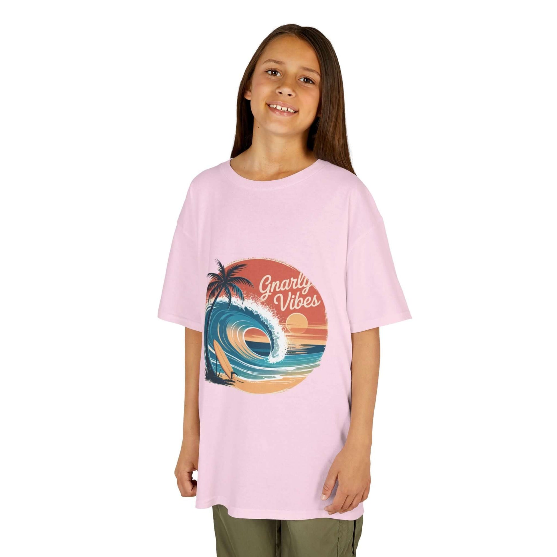 Kids tee with retro big wave surf design and 'Gnarly Vibes' in sunset beach colors, perfect for summer wear.