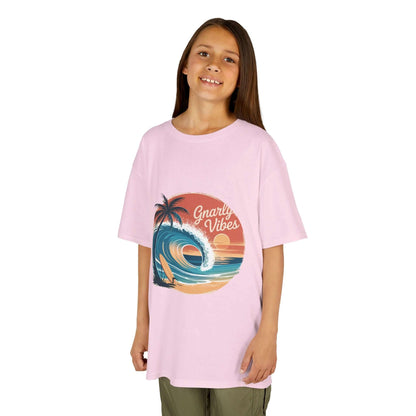 Kids tee with retro big wave surf design and 'Gnarly Vibes' in sunset beach colors, perfect for summer wear.