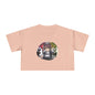 Pale pink ladies crop top featuring a DJ chibi boy playing decks at a colorful party for music lovers.