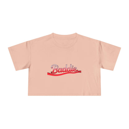 Trendy crop tee featuring liquid-like red text "Baddie" for edgy streetwear style, perfect for casual outfits.