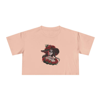 Chibi style woman with sugar skull makeup and roses on a pale pink crop top, perfect for Halloween and Day of the Dead.