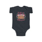 Baby bodysuit featuring gingerbread men in Santa hats with the text 'Baked With Love,' perfect for Christmas celebrations.