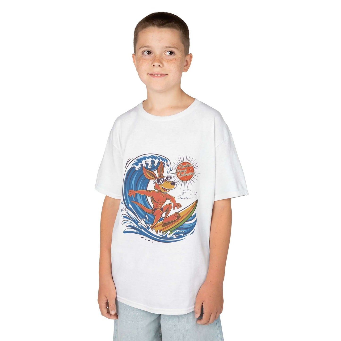 White Kids tee featuring a cool kangaroo surfing design, perfect for beach lovers and summer vibes.