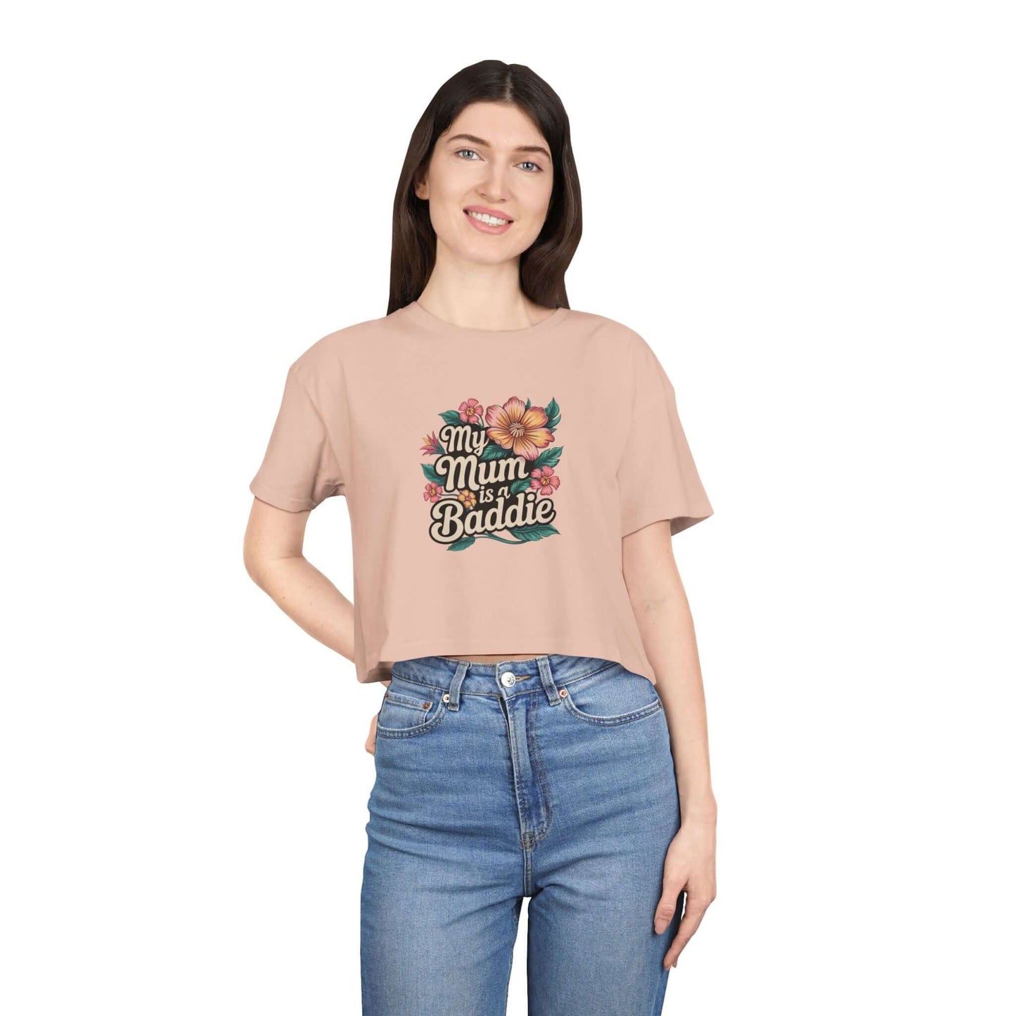 Women's crop top in pale pink with tropical flower design and text 'My Mum is a Baddie', perfect for Mother's Day.