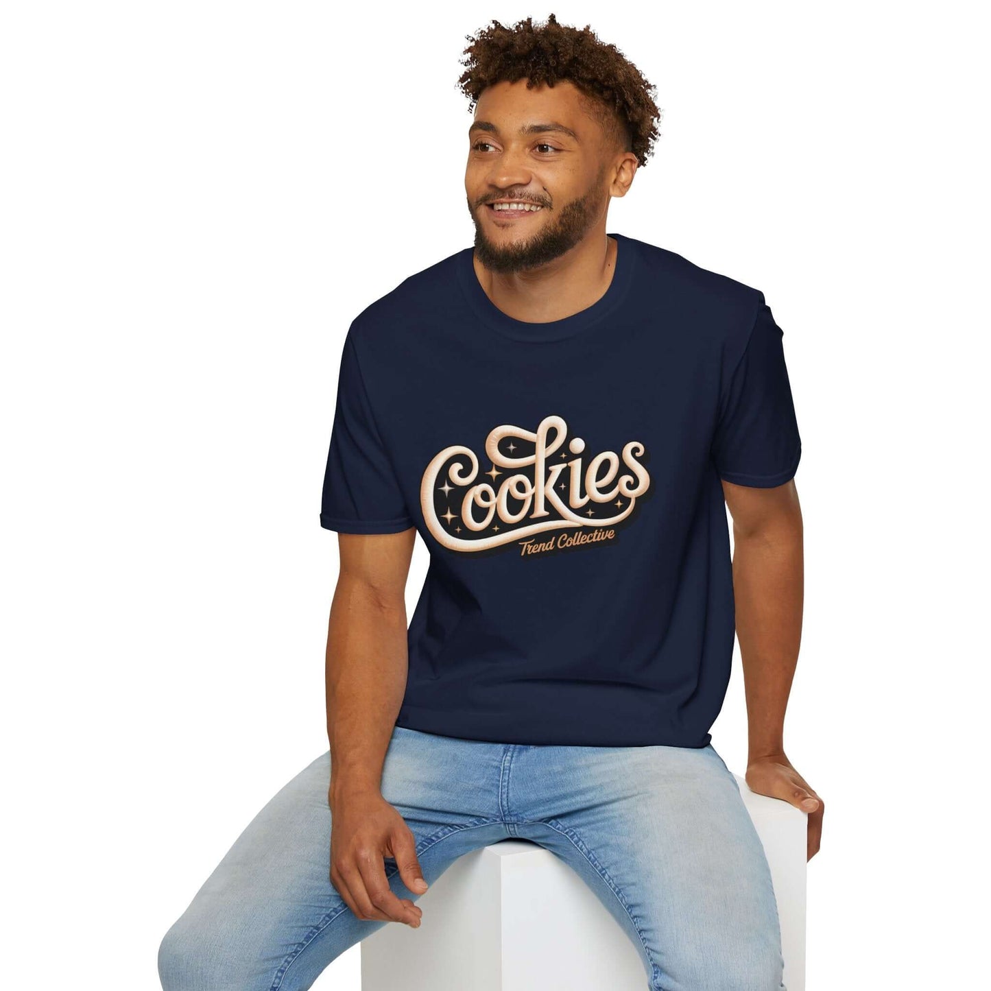 Man wearing a trendy 'Cookies Trend Collective' T-Shirt with cursive writing on a black background.