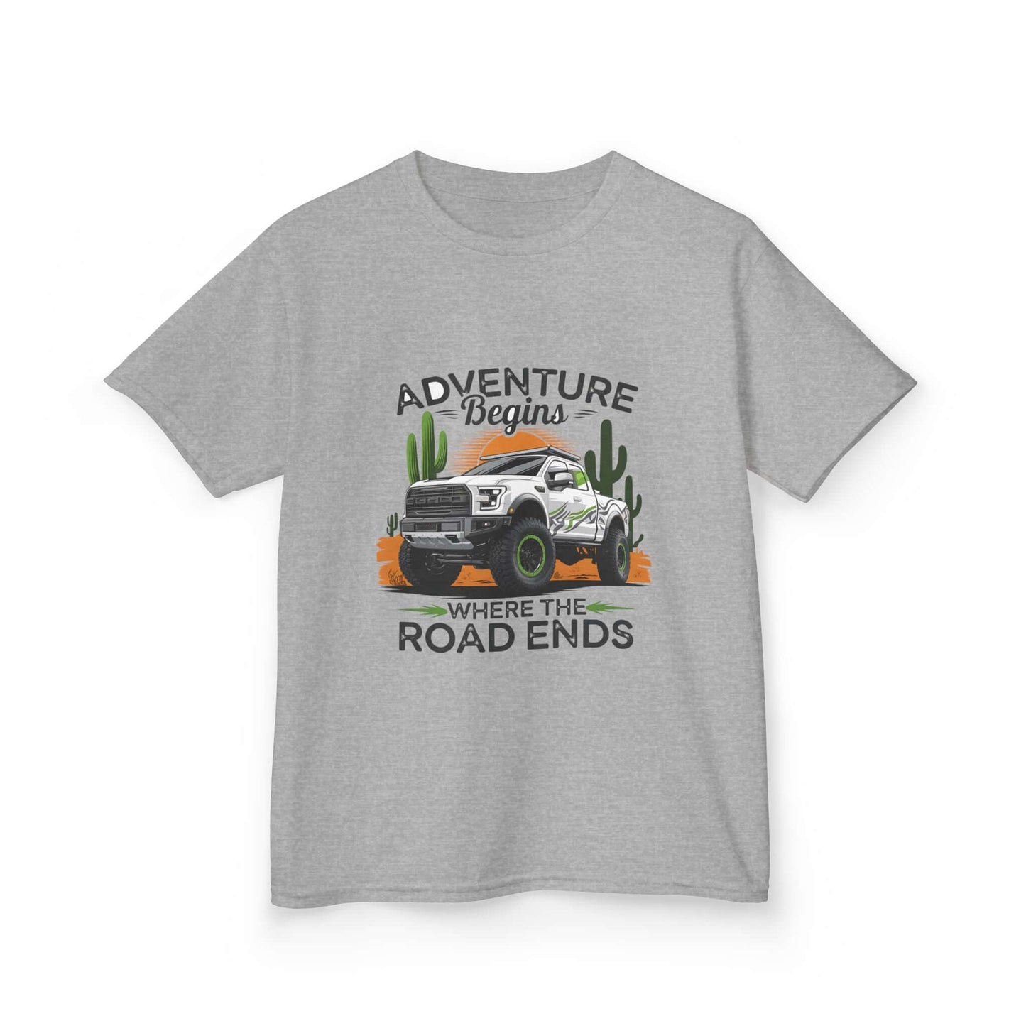 Kids T-shirt featuring off road truck in a desert with text 'Adventure begins where the road ends', perfect for outdoor enthusiasts.