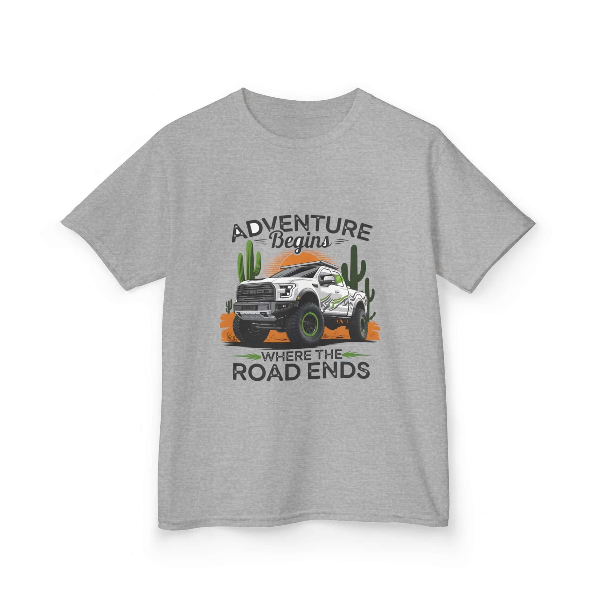 Kids T-shirt featuring off road truck in a desert with text 'Adventure begins where the road ends', perfect for outdoor enthusiasts.