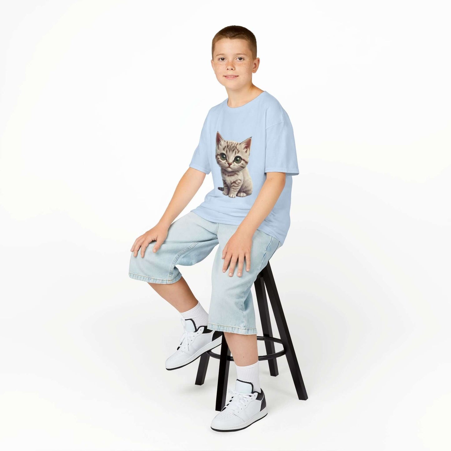 Cute light blue kid's T-shirt with adorable white kitten graphic design for children, perfect for cat lovers.