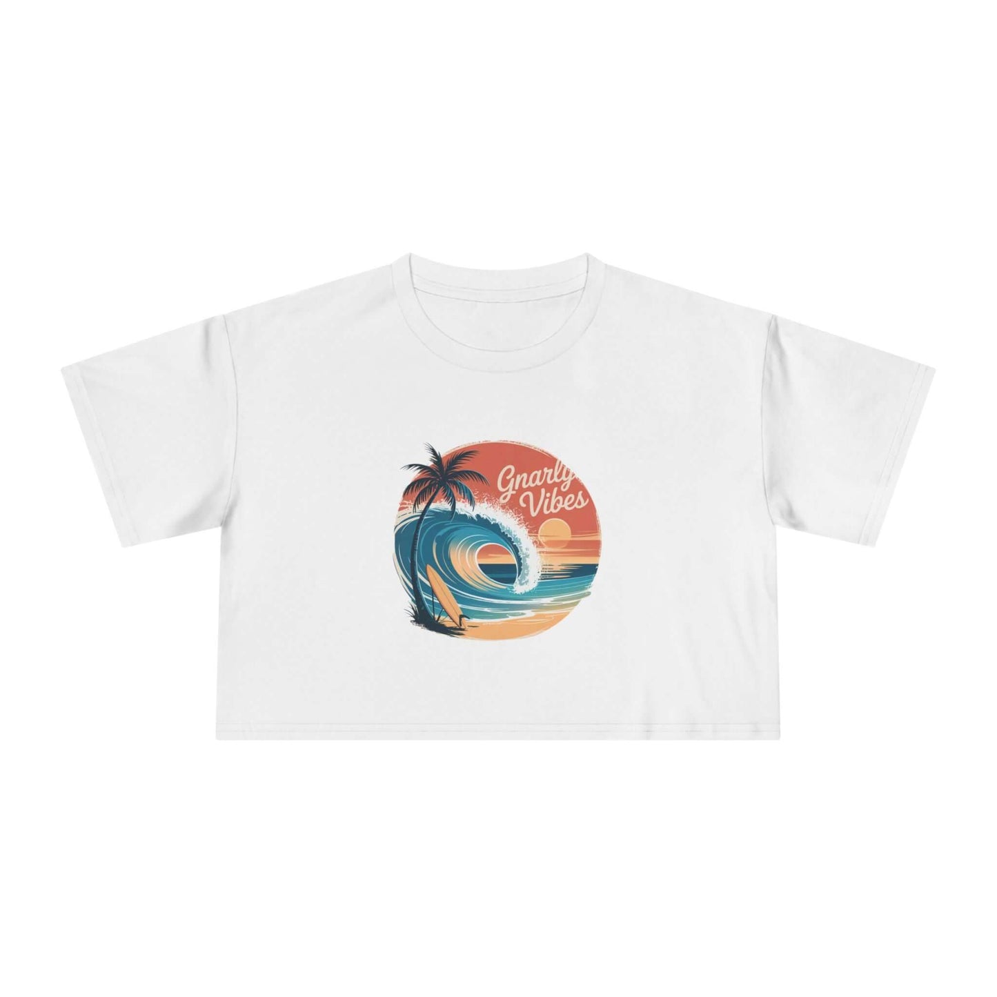 Ladies white crop top with retro 'Gnarly Vibes' surf design featuring a wave and sunset beach theme.