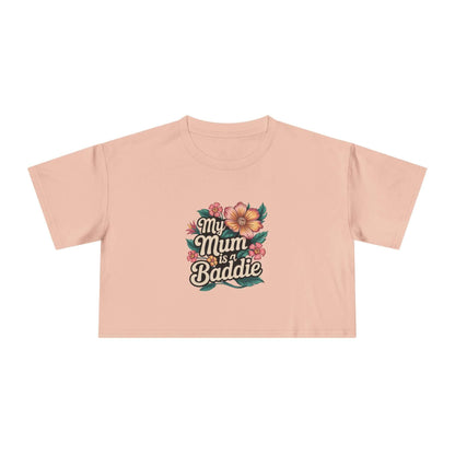Women's crop top with tropical flower design and 'My Mum is a Baddie' text, perfect for Mother's Day or everyday wear.