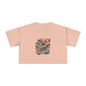 Women's crop top with tropical flower design and 'My Mum is a Baddie' text, perfect for Mother's Day or everyday wear.