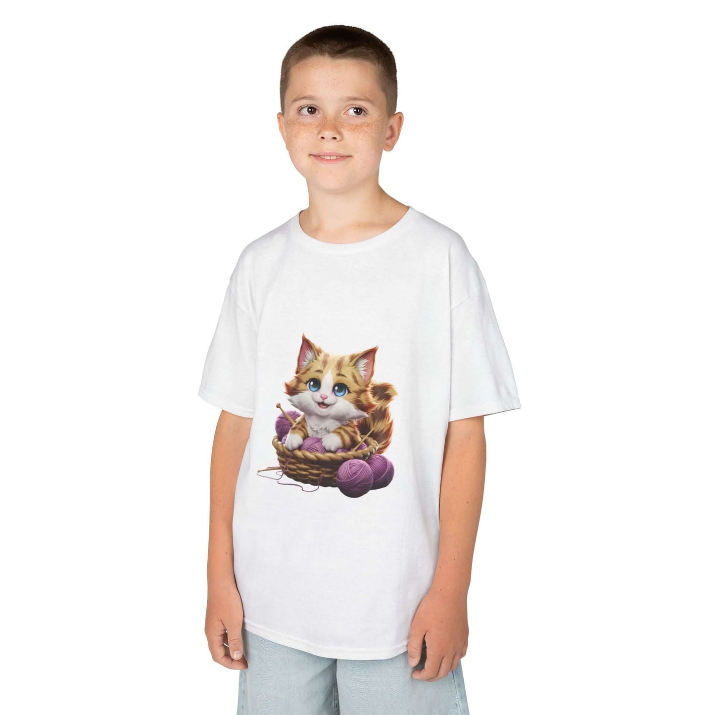 White Kid's T-shirt featuring a cute kitten playing in a basket of wool, perfect for cat lovers.