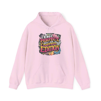 Cozy pink hoodie with colorful floral design and quote 'I'm not perfect, but I am limited edition'.