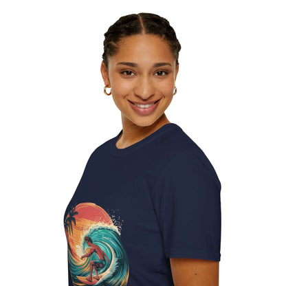 Smiling woman wearing a vintage surfer T-shirt with a vibrant wave and sunset design.