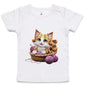 AS Colour toddler tee featuring a cute cat playing in a basket of wool, perfect for cat lovers.