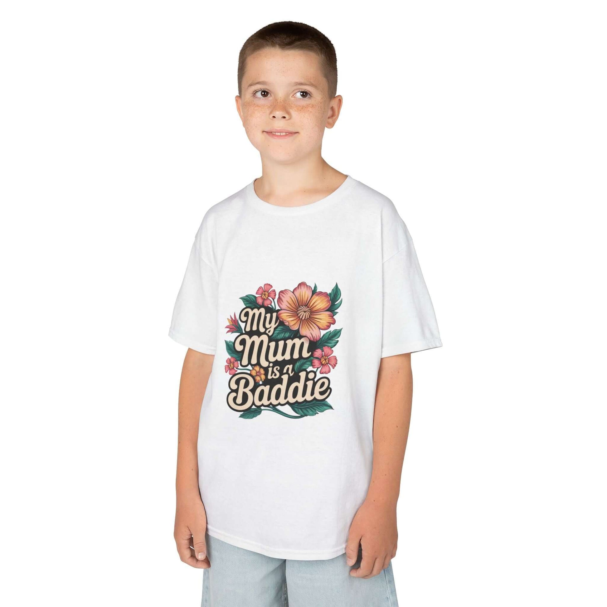 Kid wearing a white tee with tropical flower design and text 'My Mum is a Baddie', perfect for Mother's Day.