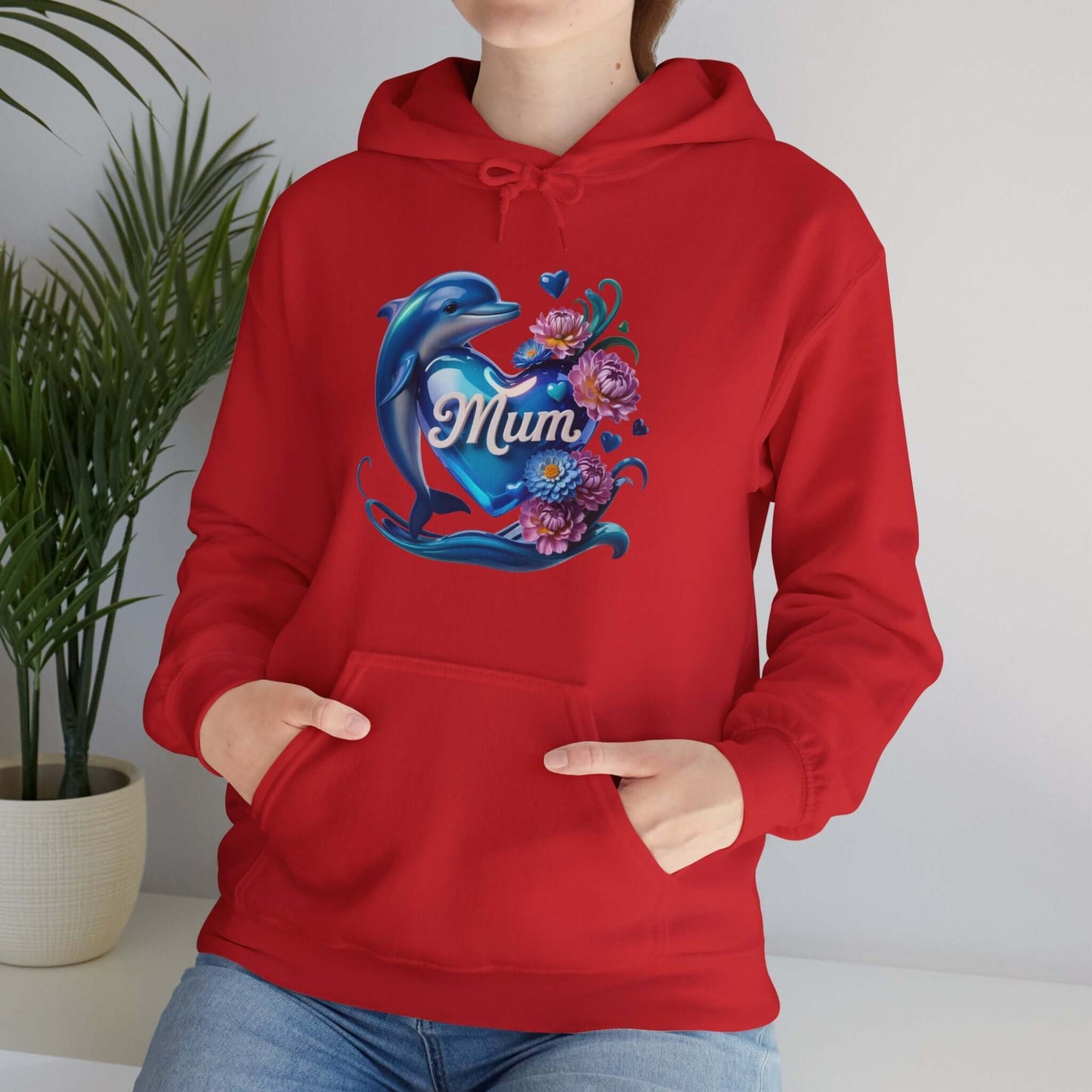 Cozy red unisex hoodie featuring dolphin holding 'Mum' heart and flowers, perfect for Mother's Day.