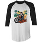 Biker riding custom bobber bike on tropical road in AS Colour 3/4 sleeve t-shirt with 'Two Wheels One Soul' text.