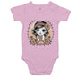 Cute baby onesie featuring a floral chibi girl design surrounded by vibrant flowers, perfect for young girls.